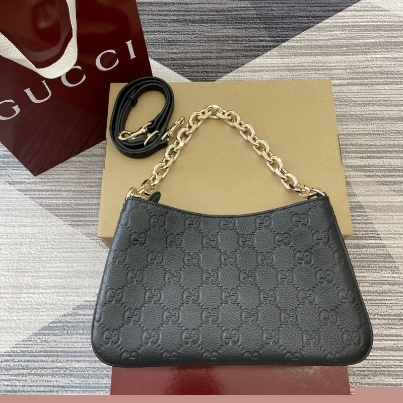 G*u*i top handle bags